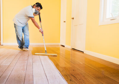 wood floor maintenance services in progress by The Floors Doctor